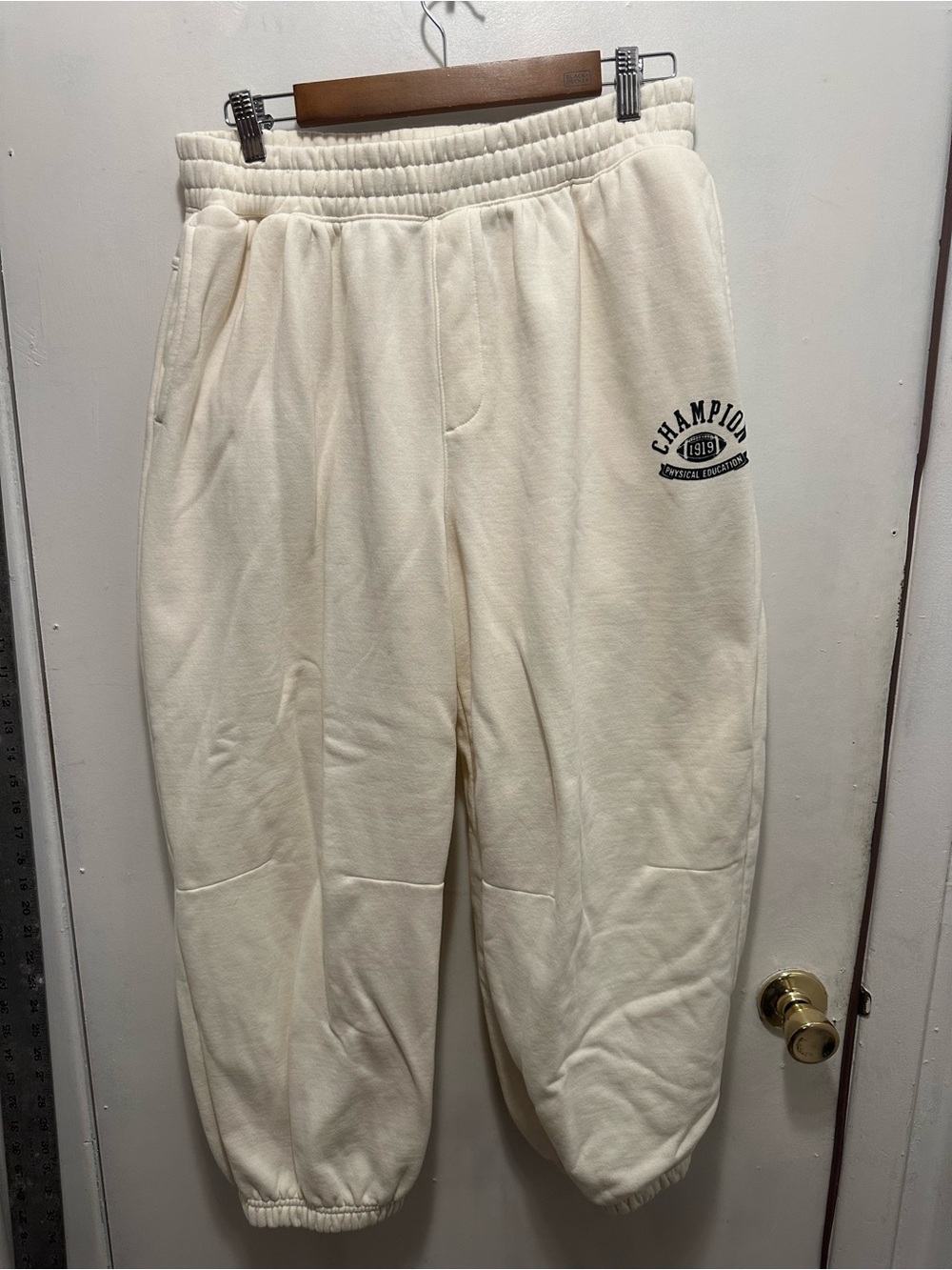Champion Reverse Weave Cream Jogger Elasticated waist and cuffs.